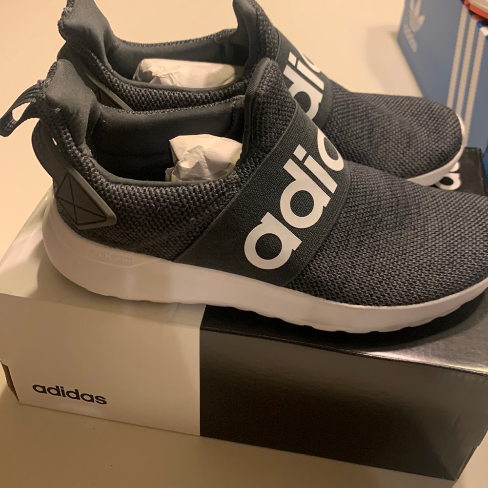 Brand new adidas lite racer adapt.